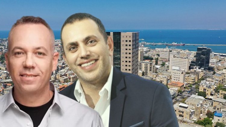 עופר אברהם ודן מנחם, על רקע מגדל ארמון בחיפה (מניבים ריט, טל גבעוני, צחי קיבנשטיין)