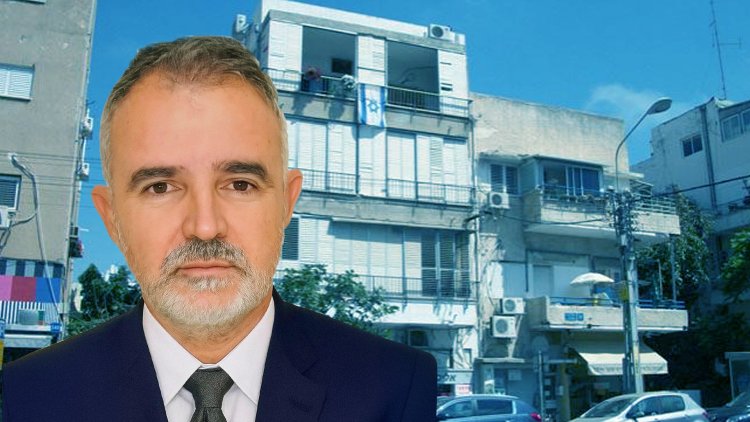 עו"ד אייל אילוז על רקע הבניין ברחוב בן יהודה בת"א (באדיבות המצולם, אתר VTLV) עו"ד אייל אילוז על רקע הבניין ברחוב בן יהודה בת"א (באדיבות המצולם, אתר VTLV)