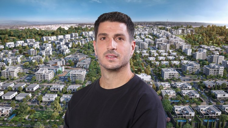 ויקטור וקרט, מנכ"ל לאומי פרטנרס, על רקע הדמיה של הפרויקט בקצרין (סטודיו דינו, viewpoint)