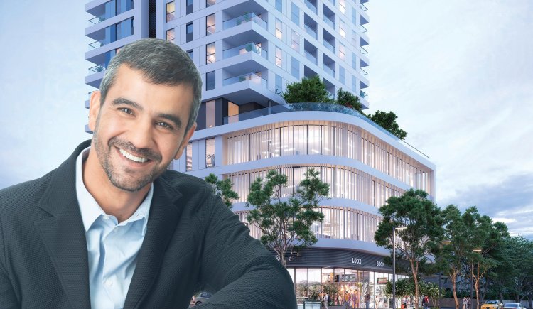 יקי אמסלם מנכ"ל קבוצת אלמוג, על רקע הדמיה של התוכנית בתל גיבורים (איציק שוקל, PITOM הדמיות)