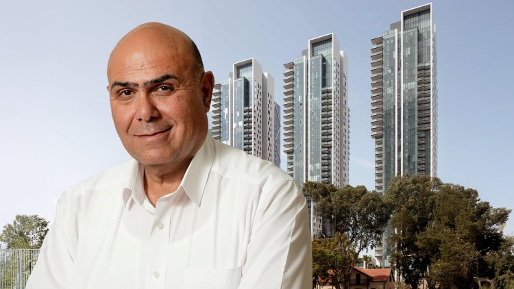 יו"ר ב.ס.ר נחשון קויתי על רקע מגדלי "בסר בשרונה" (אייל יצהר, שרון צרפתי)